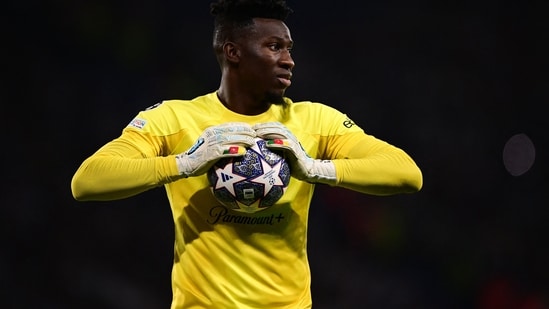 Then Inter Milan's Cameroonian goalkeeper Andre Onana holds onto the ball during the UEFA Champions League final football match between Inter Milan and Manchester City (AFP)