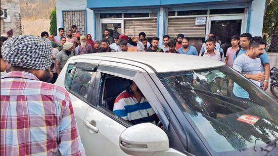 The bullet-riddled car of the victims. While one is critical after getting shot in the chest, the other suffered a bullet wound in the thigh. (HT Photo)