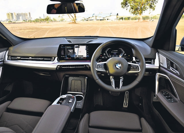 The X1’s cabin exudes luxury, with mood lighting, double-stitched leather, brushed aluminium and chrome accents. Adding a degree of freshness is the unconventional dashboard, which features vents that stretch across the length, a vertical charging pad for phones, and curved display screens integrated into the armrests.