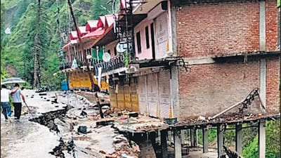 A building collapsed as cracks emerge in the middle of Khaltu Nalah market due to heavy rain, in Shimla district on Saturday. (ANI) A building collapsed as cracks emerge in the middle of Khaltu Nalah market due to heavy rain, in Shimla district on Saturday. (ANI)