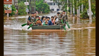 A photo released by the Army shows its personnel conducting a flood relief and rescue operation. (PTI) A photo released by the Army shows its personnel conducting a flood relief and rescue operation. (PTI)