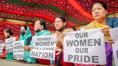 Women take part in a demonstration against ongoing violence in Manipur, in Imphal, on Friday. (ANI Photo) Women take part in a demonstration against ongoing violence in Manipur, in Imphal, on Friday. (ANI Photo)