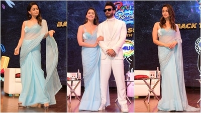 Earlier, Alia Bhatt attended a promotional event for her upcoming film Rocky Aur Rani Kii Prem Kahaani. She draped herself in an aqua-blue saree and a matching bustier blouse for the occasion. Paparazzi pages shared snippets of Alia and Ranveer Singh on social media. (HT Photo/Varinder Chawla) Earlier, Alia Bhatt attended a promotional event for her upcoming film Rocky Aur Rani Kii Prem Kahaani. She draped herself in an aqua-blue saree and a matching bustier blouse for the occasion. Paparazzi pages shared snippets of Alia and Ranveer Singh on social media. (HT Photo/Varinder Chawla)