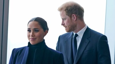 FILE - Meghan Markle, and her husband Prince Harry arrive to the observatory in One World Trade in New York, Thursday, Sept. 23, 2021. After months of speculation about whether they would be invited to the coronation, the palace announced that Harry would attend but Meghan would remain in California with their two children. (AP) FILE - Meghan Markle, and her husband Prince Harry arrive to the observatory in One World Trade in New York, Thursday, Sept. 23, 2021. After months of speculation about whether they would be invited to the coronation, the palace announced that Harry would attend but Meghan would remain in California with their two children. (AP)