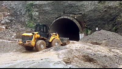 Clearance work underway after Jammu-Srinagar National Highway was closed due to incessant rainfall and landslides, in Ramban on Saturday. (ANI) Clearance work underway after Jammu-Srinagar National Highway was closed due to incessant rainfall and landslides, in Ramban on Saturday. (ANI)
