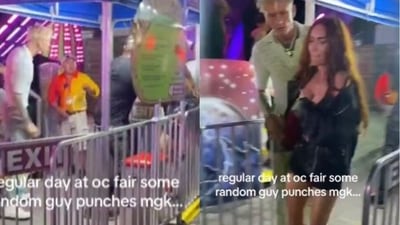 Megan Fox with Machine Gun Kelly at the fair. Megan Fox with Machine Gun Kelly at the fair.