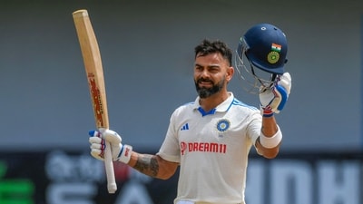 India's Virat Kohli celebrates after scoring a century against West Indies on day two of 2nd Test match (PTI) India's Virat Kohli celebrates after scoring a century against West Indies on day two of 2nd Test match (PTI)