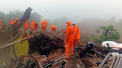 NDRF personnel during a search and rescue operation after a landslide at Irshalwadi village in Raigad district. (PTI) NDRF personnel during a search and rescue operation after a landslide at Irshalwadi village in Raigad district. (PTI)