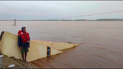 The swollen Godavari river following incessant rains, in Telangana’s Jagital on Friday. (PTI) The swollen Godavari river following incessant rains, in Telangana’s Jagital on Friday. (PTI)