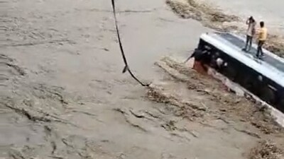 Bus stuck in water in Bijnor.