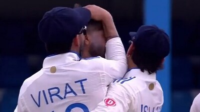 Virat Kohli celebrates with Mukesh Kumar (centre) after the latter's maiden Test wicket (Twitter) Virat Kohli celebrates with Mukesh Kumar (centre) after the latter's maiden Test wicket (Twitter)