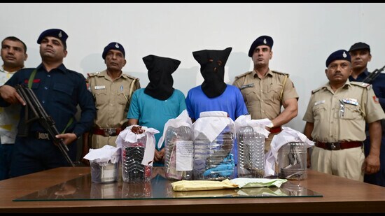 Chandigarh Police have recovered two country made pistols, seven live cartridges, a scooter and ₹1.57 lakh in cash with the arrest of two members of Deepu Banur’s gang. (Ravi Kumar/HT)