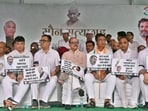Congress leaders Ajay Maken and Tariq Anwar and others during 'Silent Satyagraha' against the ongoing violence in Manipur, at Jantar Mantar, in New Delhi. Congress leaders Ajay Maken and Tariq Anwar and others during 'Silent Satyagraha' against the ongoing violence in Manipur, at Jantar Mantar, in New Delhi.
