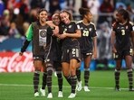 Jamaica's Deneisha Blackwood and Solai Washington celebrate after the match 