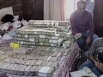 The large quantity of cash is being counted and the final figure of seizure is yet to be arrived at.