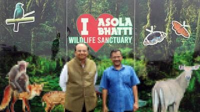 Delhi lieutenant governor VK Saxena and chief minister Arvind Kejriwal at the Van Mahotsav at Asola-Bhati Sanctuary in New Delhi on Saturday. (ANI) Delhi lieutenant governor VK Saxena and chief minister Arvind Kejriwal at the Van Mahotsav at Asola-Bhati Sanctuary in New Delhi on Saturday. (ANI)