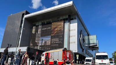 Emergency services vehicles are parked outside the shopping mall Vremena Goda (The Seasons) following the burst of a pipe in Moscow. (REUTERS)