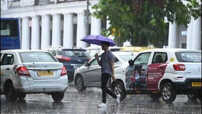 Rain at Connaught Place on Sunday. (Sanchit Khanna/HT Photo) Rain at Connaught Place on Sunday. (Sanchit Khanna/HT Photo)