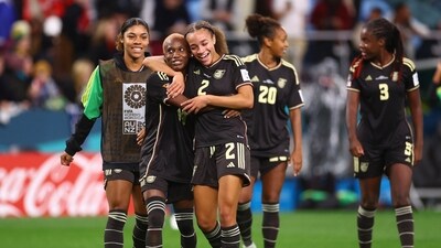 Jamaica's Deneisha Blackwood and Solai Washington celebrate after the match (REUTERS)
