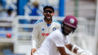 India's Virat Kohli celebrates the dismissal of West Indies' Kraigg Brathwaite (AP)