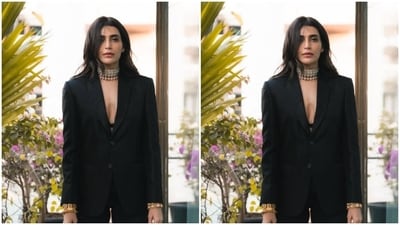 Karishma further accessorised her look with a statement silver neck choker and added more bling to her look in golden statement bracelets in both hands. (Instagram/@karishmaktanna) Karishma further accessorised her look with a statement silver neck choker and added more bling to her look in golden statement bracelets in both hands. (Instagram/@karishmaktanna)