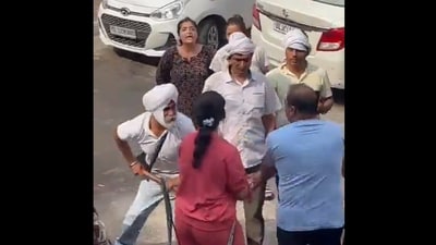 The couple seen being thrashed by their neighbours in south Delhi's Amar Colony in viral video. The couple seen being thrashed by their neighbours in south Delhi's Amar Colony in viral video.