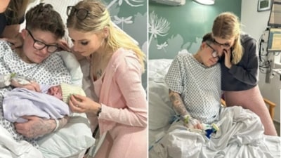 Caleb and Niamh pictured with their baby at a hospital. (Metro.UK via SWNS) Caleb and Niamh pictured with their baby at a hospital. (Metro.UK via SWNS)