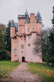 Craigievar Castle, Scotland is a fairytale-like fortress steeped in history and adorned with pink hues. (Colin + Meg on Unsplash) Craigievar Castle, Scotland is a fairytale-like fortress steeped in history and adorned with pink hues. (Colin + Meg on Unsplash)