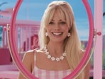 Margot Robbie in Barbie (left) and Cillian Murphy in a still from Oppenheimer.