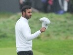 Shubhankar Sharma acknowledges the crowd on the 18th green after completing his round during the final day of the British Open Golf Championships at the Royal Liverpool Golf Club in Hoylake, England