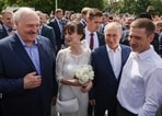 Russian President Vladimir Putin, front second right, and Belarusian President Alexander Lukashenko, front left, meet people outside the Naval Cathedral of St. Nicholas, in Kronstadt, a seaport town in the suburb of St. Petersburg, Russia, Russian President Vladimir Putin, front second right, and Belarusian President Alexander Lukashenko, front left, meet people outside the Naval Cathedral of St. Nicholas, in Kronstadt, a seaport town in the suburb of St. Petersburg, Russia,