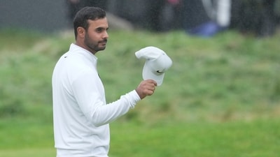 Shubhankar Sharma acknowledges the crowd on the 18th green after completing his round during the final day of the British Open Golf Championships at the Royal Liverpool Golf Club in Hoylake, England (AP) Shubhankar Sharma acknowledges the crowd on the 18th green after completing his round during the final day of the British Open Golf Championships at the Royal Liverpool Golf Club in Hoylake, England (AP)