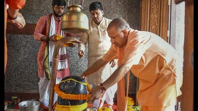 Chief minister Yogi Adityanath offers prayers on the third Monday of the month of ‘Shravan’, in Gorakhpur, Monday. (PTI Photo) Chief minister Yogi Adityanath offers prayers on the third Monday of the month of ‘Shravan’, in Gorakhpur, Monday. (PTI Photo)