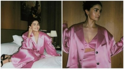 Alia Bhatt promoted her debut Hollywood film Heart of Stone in the Barbiecore way wearing a pink satin bra top, matching skirt and an oversized blazer. (Instagram/@aliaabhatt) Alia Bhatt promoted her debut Hollywood film Heart of Stone in the Barbiecore way wearing a pink satin bra top, matching skirt and an oversized blazer. (Instagram/@aliaabhatt)