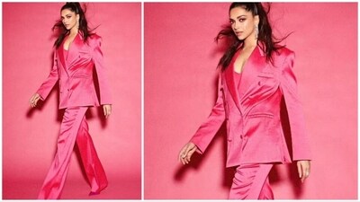 Deepika Padukone hopped into the Barbiecore trend and adorned this elegant look. She was spotted wearing a hot pink satin oversized pantsuit by Magda Butrym. (Instagram/@shaleenanathani) Deepika Padukone hopped into the Barbiecore trend and adorned this elegant look. She was spotted wearing a hot pink satin oversized pantsuit by Magda Butrym. (Instagram/@shaleenanathani)