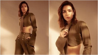 Kriti Sanon pairs cropped shirt and pants with tie and trench coat in new photoshoot. (Instagram) Kriti Sanon pairs cropped shirt and pants with tie and trench coat in new photoshoot. (Instagram)