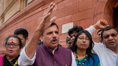 AAP MP Sanjay Singh with TMC MP Shanta Chhetri and others come out of the Parliament House during Monsoon session, in New Delhi, Monday, (PTI)