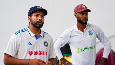 India captain Rohit Sharma and West Indies captani Kraigg Brathwaite during the ceremony. (AP) India captain Rohit Sharma and West Indies captani Kraigg Brathwaite during the ceremony. (AP)