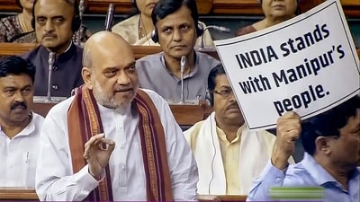 Union Home Minister Amit Shah speaks in the Lok Sabha during the Monsoon session of Parliament, in New Delhi, Monday. (PTI) Union Home Minister Amit Shah speaks in the Lok Sabha during the Monsoon session of Parliament, in New Delhi, Monday. (PTI)