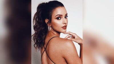 With the assistance of celebrity hairstylist Bhavya S Aroara, Tripti styled her curly locks into a high ponytail, perfectly complementing her glamorous look. (Instagram/@tripti_dimri) With the assistance of celebrity hairstylist Bhavya S Aroara, Tripti styled her curly locks into a high ponytail, perfectly complementing her glamorous look. (Instagram/@tripti_dimri)
