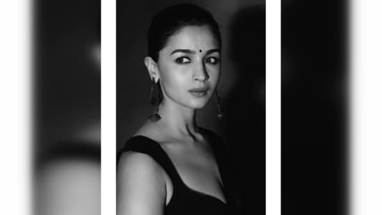 Picked from the shelves of one of India's most celebrated designers Manish Malhotra, the saree comes in a single tone and in sheer material.&nbsp;(Instagram/@aliaabhatt)