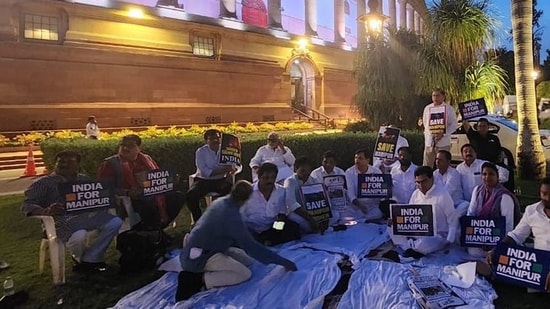 Opposition leaders seen holding protest in Parliament over Manipur issue. Opposition leaders seen holding protest in Parliament over Manipur issue.