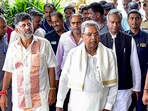 Karnataka chief minister Siddaramaiah, deputy chief minister DK Shivakumar, with Congress MLAs in Bengaluru. (PTI) Karnataka chief minister Siddaramaiah, deputy chief minister DK Shivakumar, with Congress MLAs in Bengaluru. (PTI)