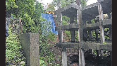 “For the past two years, the hill has witnessed massive excavation. As a result, the soil around the sides of the temple has loosened, leading to the fear of another landslide,” Mhatre said. “In 2018, I renovated the temple using my funds, but due to the digging work, the area has suffered a lot of damage. Even the stairways leading to the temple were destroyed.” (Bachchan Kumar/ HT PHOTO) “For the past two years, the hill has witnessed massive excavation. As a result, the soil around the sides of the temple has loosened, leading to the fear of another landslide,” Mhatre said. “In 2018, I renovated the temple using my funds, but due to the digging work, the area has suffered a lot of damage. Even the stairways leading to the temple were destroyed.” (Bachchan Kumar/ HT PHOTO)