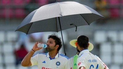 India's captain Rohit Sharma and teammate Yashasvi Jaiswal refresh during a drinks break (AP) India's captain Rohit Sharma and teammate Yashasvi Jaiswal refresh during a drinks break (AP)