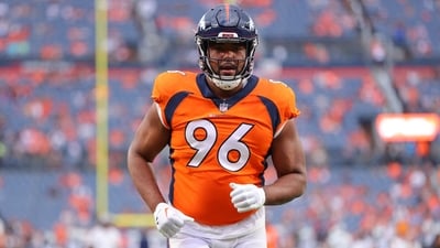 Eyioma Uwazurike #96 of the Denver Broncos warms up before the game against the Dallas Cowboys at Empower Field At Mile High on August 13, 2022 (AFP)