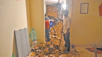 Mumbai, India - July 25, 2023 : Landslide behind Ram baug building, at Chakala, Andheri, in Mumbai, India, on Tuesday, July 25, 2023. (Photo by Vijay Bate/HT Photo) Mumbai, India - July 25, 2023 : Landslide behind Ram baug building, at Chakala, Andheri, in Mumbai, India, on Tuesday, July 25, 2023. (Photo by Vijay Bate/HT Photo)
