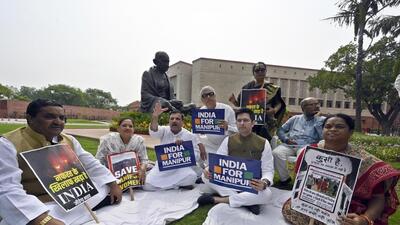 Opposition members during a sit-in protest at Parliament House Complex, in New Delhi on Tuesday. (Sanjeev Verma/HT photo) Opposition members during a sit-in protest at Parliament House Complex, in New Delhi on Tuesday. (Sanjeev Verma/HT photo)