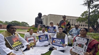 Opposition members during a sit-in protest at Parliament House Complex, in New Delhi on Tuesday. (Sanjeev Verma/HT photo) Opposition members during a sit-in protest at Parliament House Complex, in New Delhi on Tuesday. (Sanjeev Verma/HT photo)