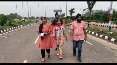 Pilgrims entering passenger terminal of Kartarpur corridor at Dera Baba Nanak in Gurdaspur district to visit Gurdwara Darbar Sahib, Kartarpur in Pakistan after reopening of the corridor on Tuesday. (HT Photo)